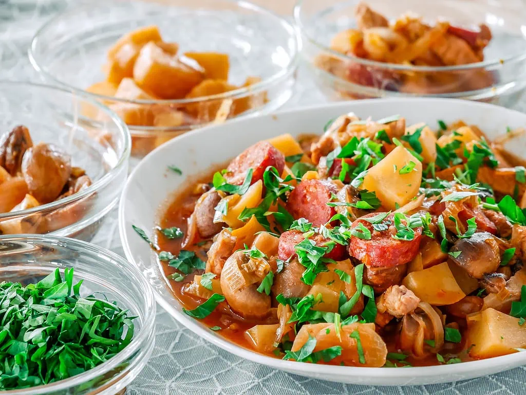 Hubertustopf mit Champignons tortellini schinken sahne soße