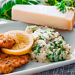 Parmesan-Schnitzel zu Rucola-Risotto